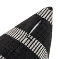 Close-up view of the Luxurious Waterman Pillow, focusing on the intricate black and white striped fabric, emphasizing its high-quality material and detailed design.