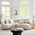 Modern Boyega Pillows on a cozy beige sofa in a stylish living room, highlighting their elegant geometric design and neutral tones.