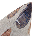 Close-up view of the corner zipper on the Vibrant Brightside Pillow, showcasing its intricate textured fabric in shades of blue, brown, and beige.