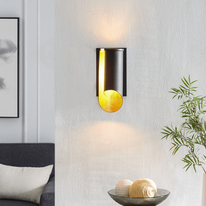 Modern industrial Ada wall sconce mounted on a wall